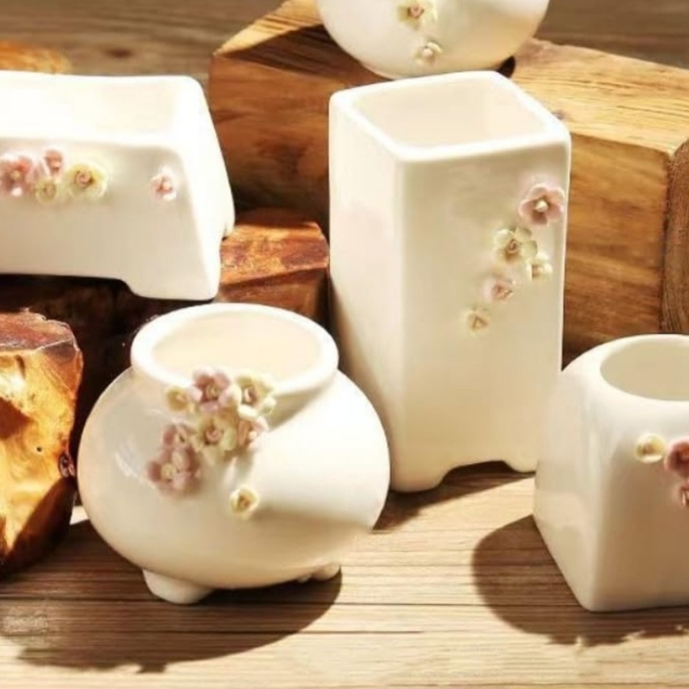 Elegant Ceramic Vases with Floral Accents